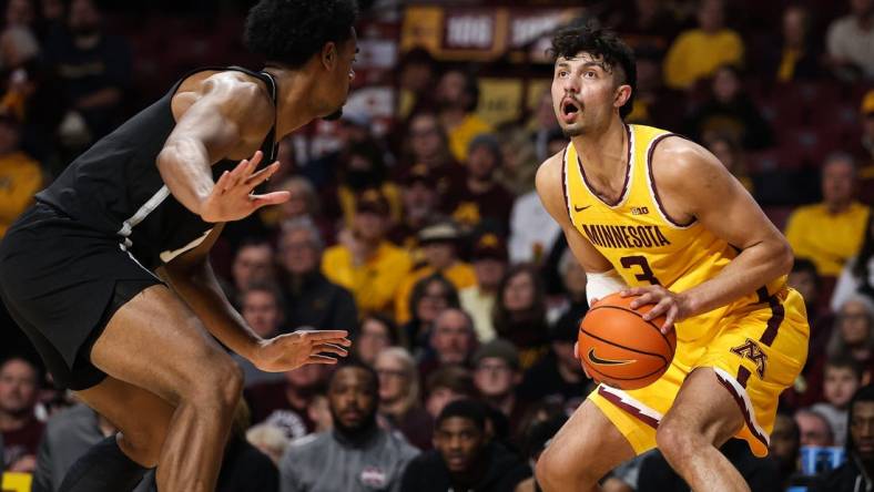 Dec 11, 2022; Minneapolis, Minnesota, USA; Minnesota Golden Gophers forward Dawson Garcia (3) looks to shoot against the Mississippi State Bulldogs during the first half at Williams Arena. Mandatory Credit: Matt Krohn-USA TODAY Sports