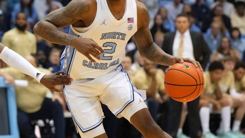 Dec 10, 2022; Chapel Hill, North Carolina, USA; North Carolina Tar Heels guard Caleb Love (2) dribbles in the second half at Dean E. Smith Center. Mandatory Credit: Bob Donnan-USA TODAY Sports