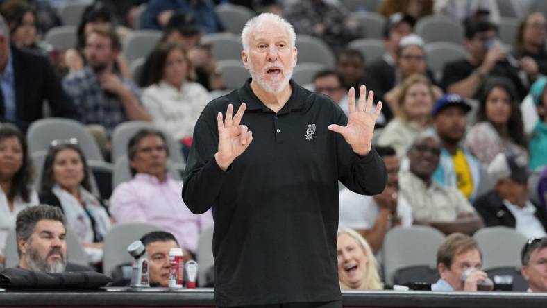 Dec 12, 2022; San Antonio, Texas, USA; San Antonio Spurs head coach Gregg Popovich signals to his team in the second half against the Cleveland Cavaliers at the AT&T Center. Mandatory Credit: Daniel Dunn-USA TODAY Sports