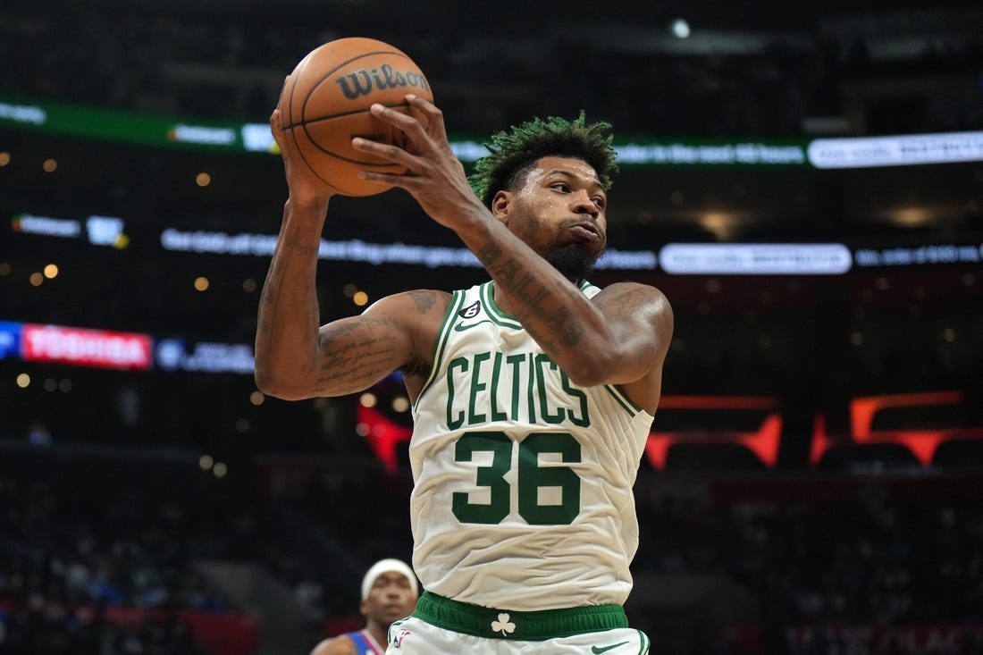 Lakers finally home, face rival Celtics