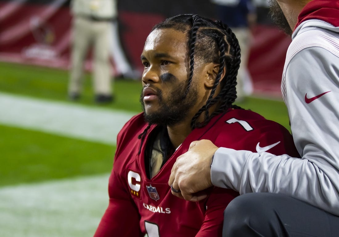 Dec 12, 2022; Glendale, Arizona, USA; Arizona Cardinals quarterback Kyler Murray reacts after suffering an injury against the New England Patriots in the first half at State Farm Stadium. Mandatory Credit: Mark J. Rebilas-USA TODAY Sports