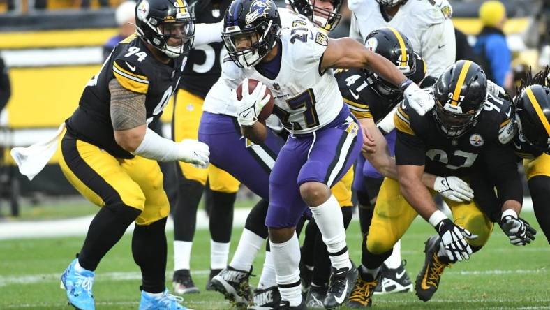 Dec 11, 2022; Pittsburgh, Pennsylvania, USA;  Baltimore Ravens running back J.K. Dobbins (27) during the fourth quarter at Acrisure Stadium. Mandatory Credit: Philip G. Pavely-USA TODAY Sports