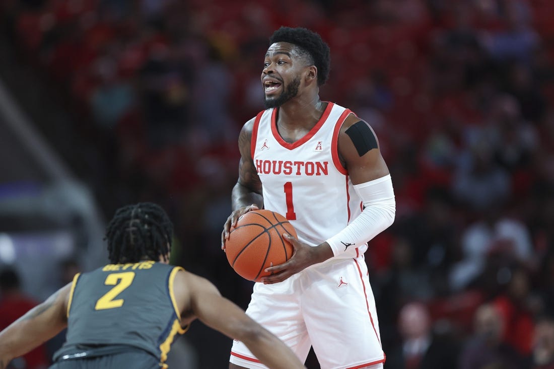 Dec 13, 2022; Houston, Texas, USA; Houston Cougars guard Jamal Shead (1) controls the ball during the first half against the North Carolina A&T Aggies at Fertitta Center. Mandatory Credit: Troy Taormina-USA TODAY Sports