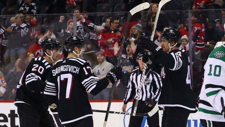 Dec 13, 2022; Newark, New Jersey, USA; New Jersey Devils left wing Miles Wood (44) celebrates his goal against the Dallas Stars during the second period at Prudential Center. Mandatory Credit: Ed Mulholland-USA TODAY Sports