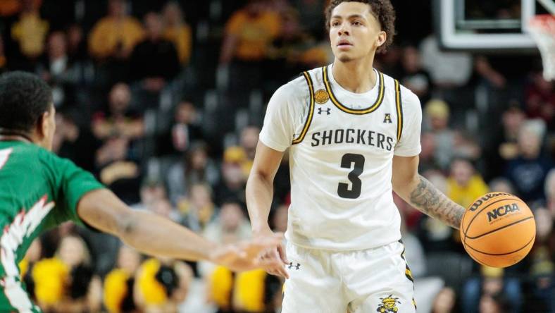 Dec 13, 2022; Wichita, Kansas, USA; Wichita State Shockers guard Craig Porter Jr. (3) looks to pass during the first half against the Mississippi Valley State Delta Devils at Charles Koch Arena. Mandatory Credit: William Purnell-USA TODAY Sports