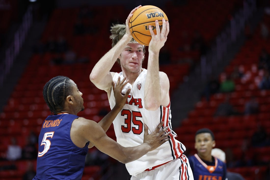 Dec 13, 2022; Salt Lake City, Utah, USA; Utah Utes center Branden Carlson (35) looks to shoot against Texas-San Antonio Roadrunners guard DJ Richards (5) in the second half at Jon M. Huntsman Center. Mandatory Credit: Jeffrey Swinger-USA TODAY Sports