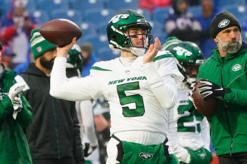 Dec 11, 2022; Orchard Park, New York, USA; New York Jets quarterback Mike White (5) warms up prior to the game against the Buffalo Bills at Highmark Stadium. Mandatory Credit: Gregory Fisher-USA TODAY Sports