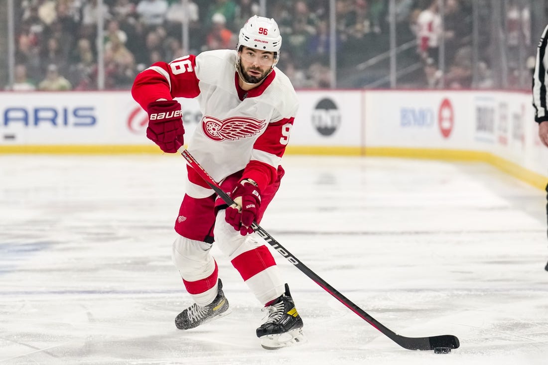 Dec 14, 2022; Saint Paul, Minnesota, USA; Detroit Red Wings defenseman Jake Walman (96) passes during the first period against the Minnesota Wild at Xcel Energy Center. Mandatory Credit: Brace Hemmelgarn-USA TODAY Sports