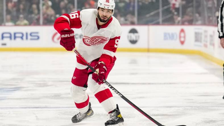 Dec 14, 2022; Saint Paul, Minnesota, USA; Detroit Red Wings defenseman Jake Walman (96) passes during the first period against the Minnesota Wild at Xcel Energy Center. Mandatory Credit: Brace Hemmelgarn-USA TODAY Sports