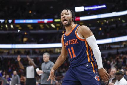 Dec 14, 2022; Chicago, Illinois, USA; New York Knicks guard Jalen Brunson (11) reacts after making a three-pointer against the Chicago Bulls in overtime at United Center. Mandatory Credit: Kamil Krzaczynski-USA TODAY Sports