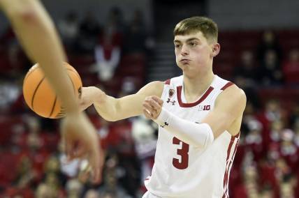 Dec 15, 2022; Madison, Wisconsin, USA;  Wisconsin Badgers guard Connor Essegian (3) passes the ball during the second half against the Lehigh Mountain Hawks at the Kohl Center. Mandatory Credit: Kayla Wolf-USA TODAY Sports