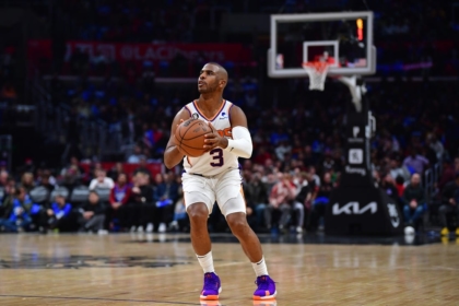 Dec 15, 2022; Los Angeles, California, USA; Phoenix Suns guard Chris Paul (3) shoots against the Los Angeles Clippers during the second half at Crypto.com Arena. Mandatory Credit: Gary A. Vasquez-USA TODAY Sports