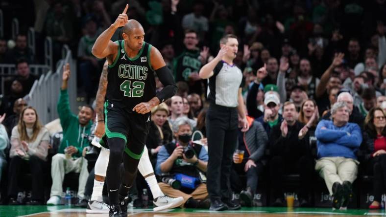 Dec 16, 2022; Boston, Massachusetts, USA; Boston Celtics center Al Horford (42) reacts after his basket against the Orlando Magic in the first quarter at TD Garden. Mandatory Credit: David Butler II-USA TODAY Sports