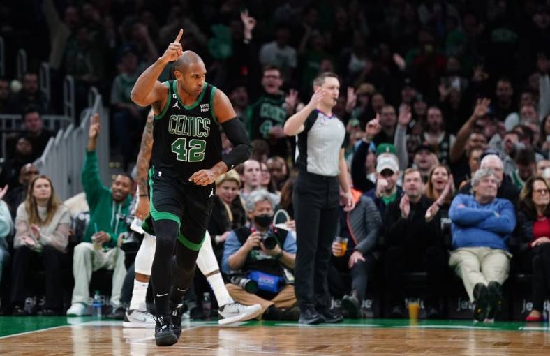 Dec 16, 2022; Boston, Massachusetts, USA; Boston Celtics center Al Horford (42) reacts after his basket against the Orlando Magic in the first quarter at TD Garden. Mandatory Credit: David Butler II-USA TODAY Sports