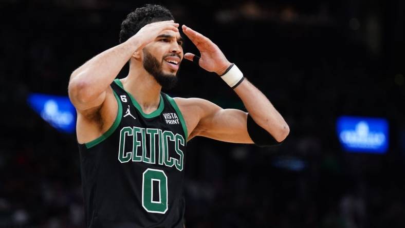 Dec 16, 2022; Boston, Massachusetts, USA; Boston Celtics forward Jayson Tatum (0) reacts to a call as they take on the Orlando Magic in the second half at TD Garden. Mandatory Credit: David Butler II-USA TODAY Sports