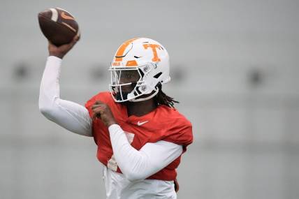 Tennessee quarterback Joe Milton III (7) throws a pass during Tennessee football practice at Haslam Field in Knoxville, Tenn., on Saturday, Dec. 17, 2022. The Vols are preparing to play in the Orange Bowl against Clemson on Dec. 30.

Ut Football Practice