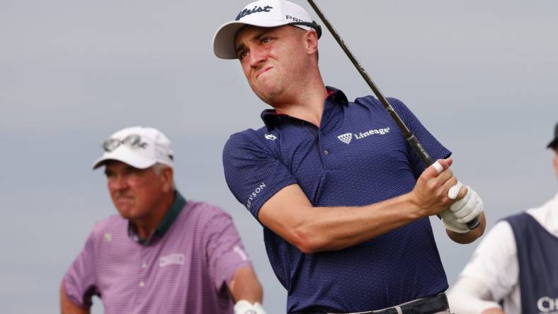 Dec 17, 2022; Orlando, Florida, USA;  Justin Thomas watches his drive on the tenth tee with father Mike Thomas looking on during the first round of the PNC Championship golf tournament at Ritz Carlton Golf Club Grande Lakes Orlando Course. Mandatory Credit: Reinhold Matay-USA TODAY Sports