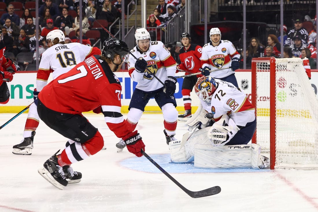 Reinhart scores twice, Bobrovsky makes 31 saves as Panthers beat Devils 4-3  for their first win
