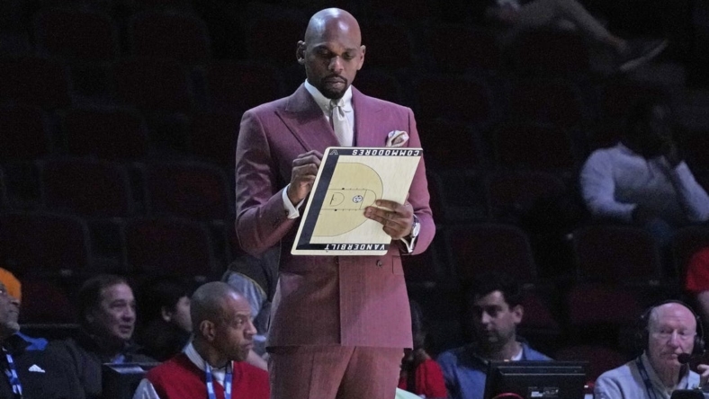 Dec 17, 2022; Chicago, Illinois, USA; Vanderbilt Commodores head coach Jerry Stackhouse draws up a play during the first half  at United Center. Mandatory Credit: David Banks-USA TODAY Sports