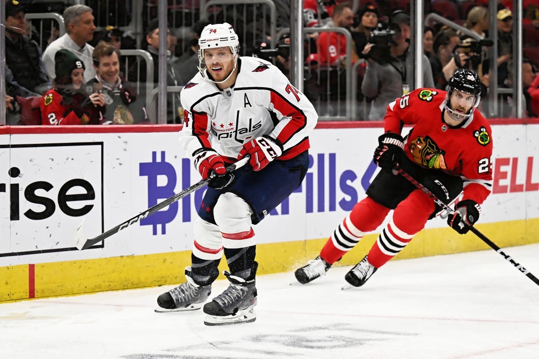 Dec 13, 2022; Chicago, Illinois, USA;  Washington Capitals defenseman John Carlson (74) skates against the Chicago Blackhawks at United Center. Mandatory Credit: Jamie Sabau-USA TODAY Sports