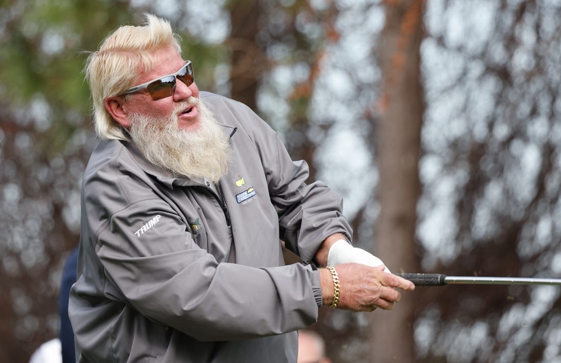 Dec 18, 2022; Orlando, Florida, USA; John Daly hits his tee shot on the fourth hole during the final round of the PNC Championship golf tournament at Ritz Carlton Golf Club Grande Lakes Orlando Course. Mandatory Credit: Reinhold Matay-USA TODAY Sports