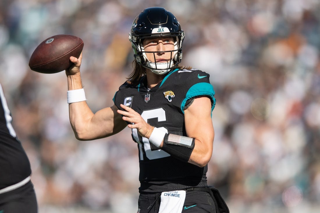 Dec 18, 2022; Jacksonville, Florida, USA; Jacksonville Jaguars quarterback Trevor Lawrence (16) throws the ball against the Dallas Cowboys in the second quarter at TIAA Bank Field. Mandatory Credit: Jeremy Reper-USA TODAY Sports