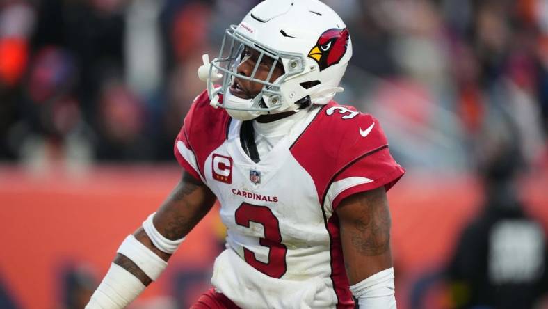 Dec 18, 2022; Denver, Colorado, USA; Arizona Cardinals safety Budda Baker (3) reacts to his interception in the second half against the Denver Broncos at Empower Field at Mile High. Mandatory Credit: Ron Chenoy-USA TODAY Sports