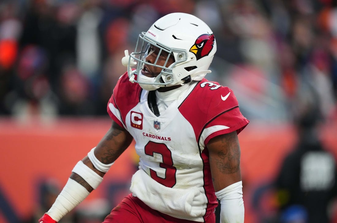 Dec 18, 2022; Denver, Colorado, USA; Arizona Cardinals safety Budda Baker (3) reacts to his interception in the second half against the Denver Broncos at Empower Field at Mile High. Mandatory Credit: Ron Chenoy-USA TODAY Sports