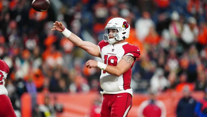 Dec 18, 2022; Denver, Colorado, USA; Arizona Cardinals quarterback Trace McSorley (19) passes the ball in the second half against the Denver Broncos at Empower Field at Mile High. Mandatory Credit: Ron Chenoy-USA TODAY Sports