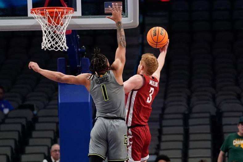 Dec 18, 2022; Dallas, Texas, USA; Washington State Cougars guard Jabe Mullins (3) scores a layup against Baylor Bears guard Keyonte George (1) during the second half at American Airlines Center. Mandatory Credit: Chris Jones-USA TODAY Sports