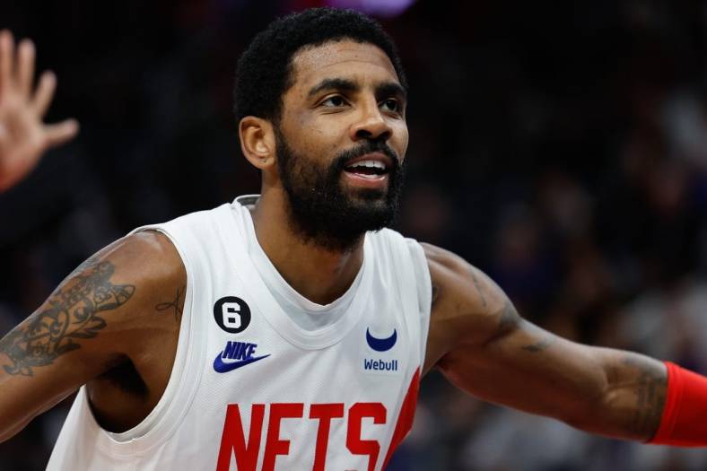 Dec 18, 2022; Detroit, Michigan, USA;  Brooklyn Nets guard Kyrie Irving (11) against the Detroit Pistons at Little Caesars Arena. Mandatory Credit: Rick Osentoski-USA TODAY Sports