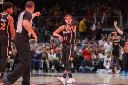 Dec 19, 2022; Atlanta, Georgia, USA; Atlanta Hawks guard Trae Young (11) reacts after being called for a technical foul against the Orlando Magic in the second half at State Farm Arena. Mandatory Credit: Brett Davis-USA TODAY Sports