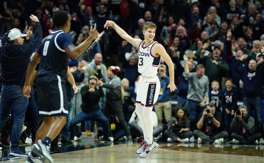 Dec 20, 2022; Storrs, Connecticut, USA; UConn Huskies guard Joey Calcaterra (3) reacts after his three point basket against the Georgetown Hoyas in the second half at Harry A. Gampel Pavilion. Mandatory Credit: David Butler II-USA TODAY Sports