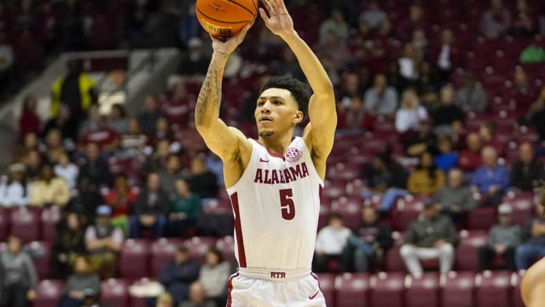 Dec 20, 2022; Tuscaloosa, Alabama, USA; Alabama Crimson Tide guard Jahvon Quinerly (5) shoots against Jackson State Tigers during the first half at Coleman Coliseum. Mandatory Credit: Marvin Gentry-USA TODAY Sports
