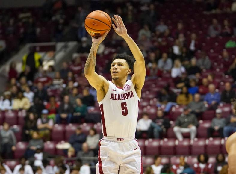 Dec 20, 2022; Tuscaloosa, Alabama, USA; Alabama Crimson Tide guard Jahvon Quinerly (5) shoots against Jackson State Tigers during the first half at Coleman Coliseum. Mandatory Credit: Marvin Gentry-USA TODAY Sports