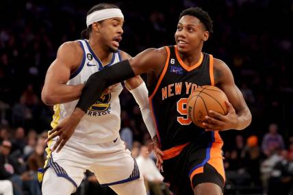 Dec 20, 2022; New York, New York, USA; New York Knicks guard RJ Barrett (9) drives to the basket against Golden State Warriors guard Moses Moody (4) during the third quarter at Madison Square Garden. Mandatory Credit: Brad Penner-USA TODAY Sports