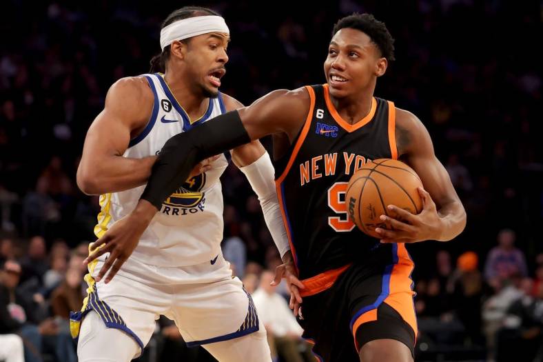 Dec 20, 2022; New York, New York, USA; New York Knicks guard RJ Barrett (9) drives to the basket against Golden State Warriors guard Moses Moody (4) during the third quarter at Madison Square Garden. Mandatory Credit: Brad Penner-USA TODAY Sports