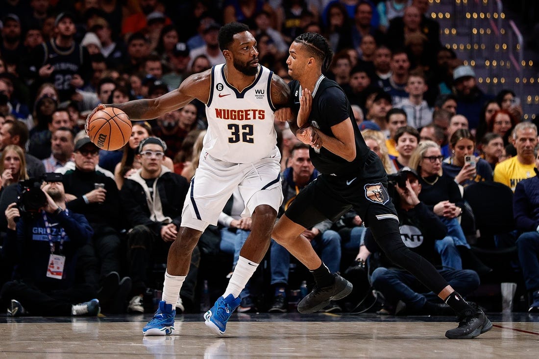 Dec 20, 2022; Denver, Colorado, USA; Denver Nuggets forward Jeff Green (32) controls the ball as Memphis Grizzlies forward Ziaire Williams (8) guards in the second quarter at Ball Arena. Mandatory Credit: Isaiah J. Downing-USA TODAY Sports