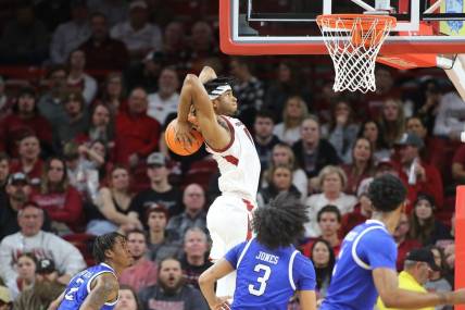 Dec 21, 2022; Fayetteville, Arkansas, USA; Arkansas Razorbacks guard Ricky Council IV (1) goes up for a dunk in the first half against the UNC Asheville Bulldogs at Bud Walton Arena. Mandatory Credit: Nelson Chenault-USA TODAY Sports