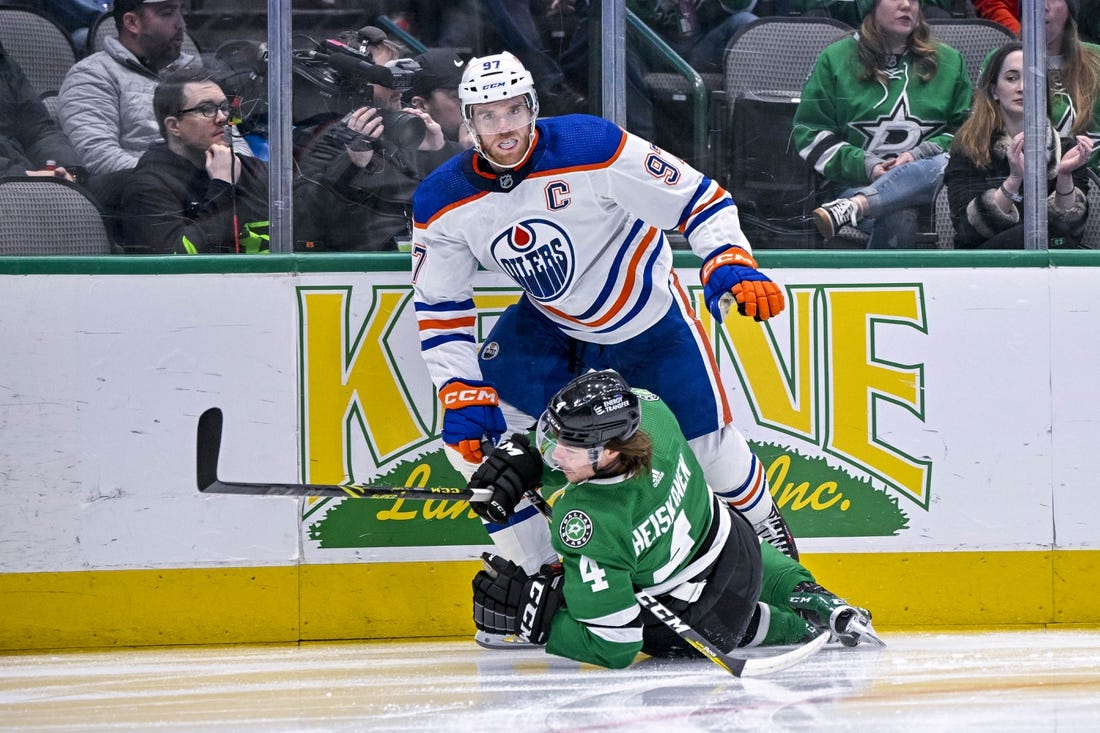 Oilers stomp Flames to put quick end to Sutter's honeymoon in