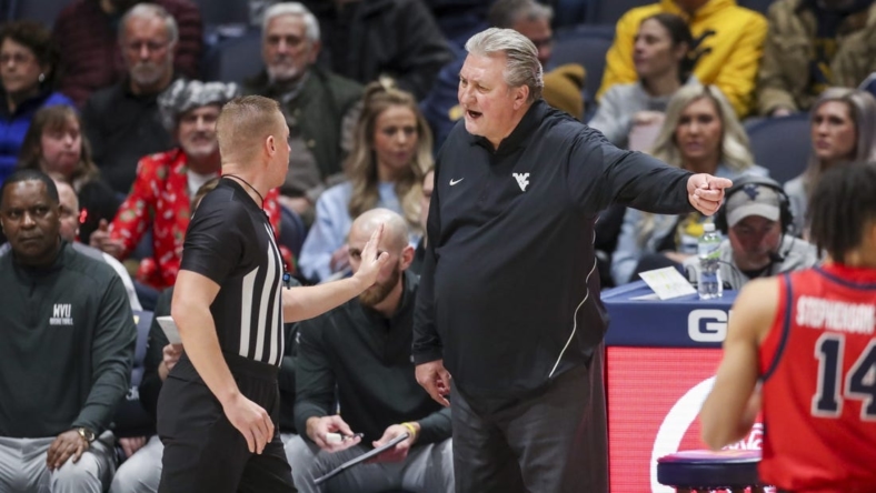 Dec 22, 2022; Morgantown, West Virginia, USA; West Virginia Mountaineers head coach Bob Huggins argues a call with an official during the first half against the Stony Brook Seawolves at WVU Coliseum. Mandatory Credit: Ben Queen-USA TODAY Sports