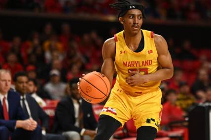Dec 22, 2022; College Park, Maryland, USA;  Maryland Terrapins guard Ian Martinez (23) dribbles during the second half St. Peter's Peacocks at Xfinity Center. Mandatory Credit: Tommy Gilligan-USA TODAY Sports
