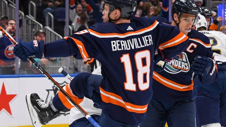 Dec 23, 2022; Elmont, New York, USA;  New York Islanders left wing Anthony Beauvillier (18) celebrates his goal against the Florida Panthers during the second period at UBS Arena. Mandatory Credit: Dennis Schneidler-USA TODAY Sports