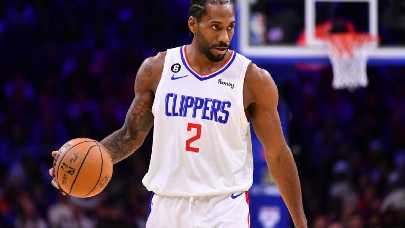 Dec 23, 2022; Philadelphia, Pennsylvania, USA; Los Angeles Clippers forward Kawhi Leonard (2) controls the ball against the Philadelphia 76ers in the fourth quarter at Wells Fargo Center. Mandatory Credit: Kyle Ross-USA TODAY Sports