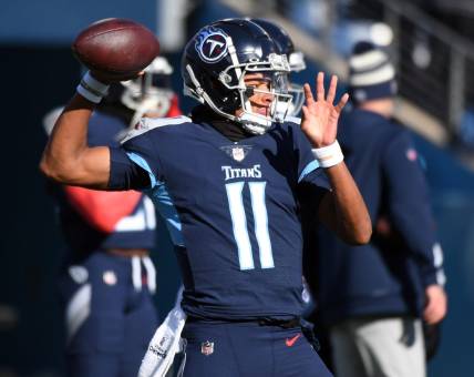 Dec 24, 2022; Nashville, Tennessee, USA; Tennessee Titans quarterback Joshua Dobbs (11) warms up before the game against the Houston Texans at Nissan Stadium. Mandatory Credit: Christopher Hanewinckel-USA TODAY Sports