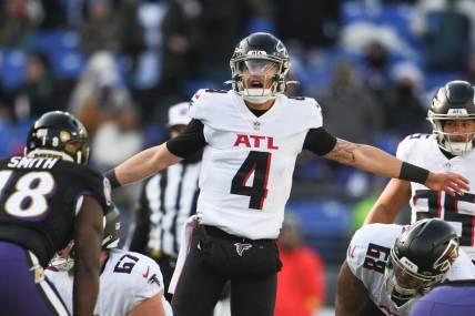 Dec 24, 2022; Baltimore, Maryland, USA;  Atlanta Falcons quarterback Desmond Ridder (4) calls a play at the line during the first half against the Baltimore Ravens at M&T Bank Stadium. Mandatory Credit: Tommy Gilligan-USA TODAY Sports
