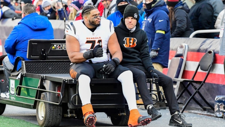 Dec 24, 2022; Foxborough, Massachusetts, USA; Cincinnati Bengals offensive tackle La'el Collins (71) leaves the field on a cart during the first half against the New England Patriots at Gillette Stadium. Mandatory Credit: Eric Canha-USA TODAY Sports