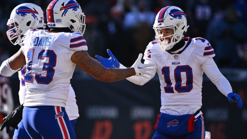 Dec 24, 2022; Chicago, Illinois, USA;  Buffalo Bills wide receiver Khalil Shakir (10) celebrates with wide receiver Gabe Davis (13) after scoring a successful two-point try in the third quarter against the Chicago Bears at Soldier Field. Buffalo defeated Chicago 35-13. Mandatory Credit: Jamie Sabau-USA TODAY Sports