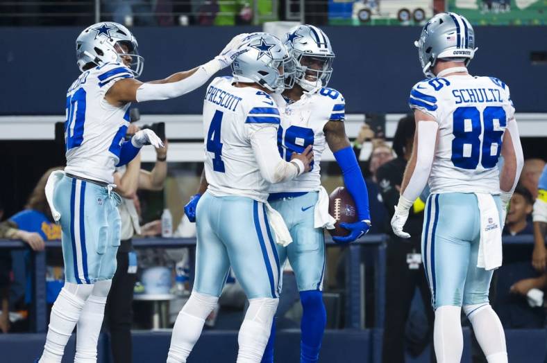 Dec 24, 2022; Arlington, Texas, USA;  Dallas Cowboys wide receiver CeeDee Lamb (88) celebrates with teammates after scoring a touchdown  during the second half against the Philadelphia Eagles at AT&T Stadium. Mandatory Credit: Kevin Jairaj-USA TODAY Sports