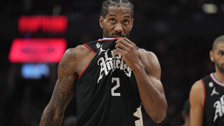 Dec 27, 2022; Toronto, Ontario, CAN; LA Clippers forward Kawhi Leonard (2) comes off the court during a time-out against the Toronto Raptors during the first half at Scotiabank Arena. Mandatory Credit: John E. Sokolowski-USA TODAY Sports